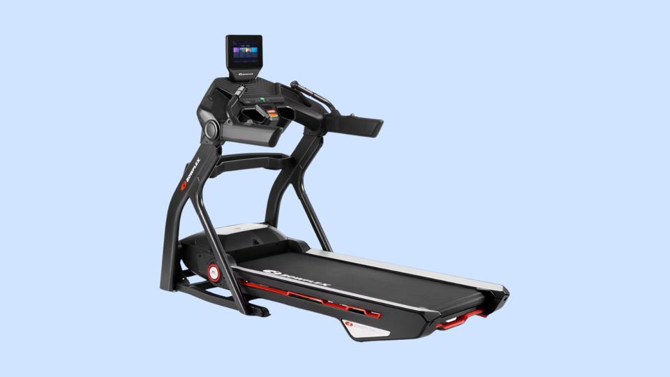 Blue background featuring a product shot of a BowFlex 10 treadmill.